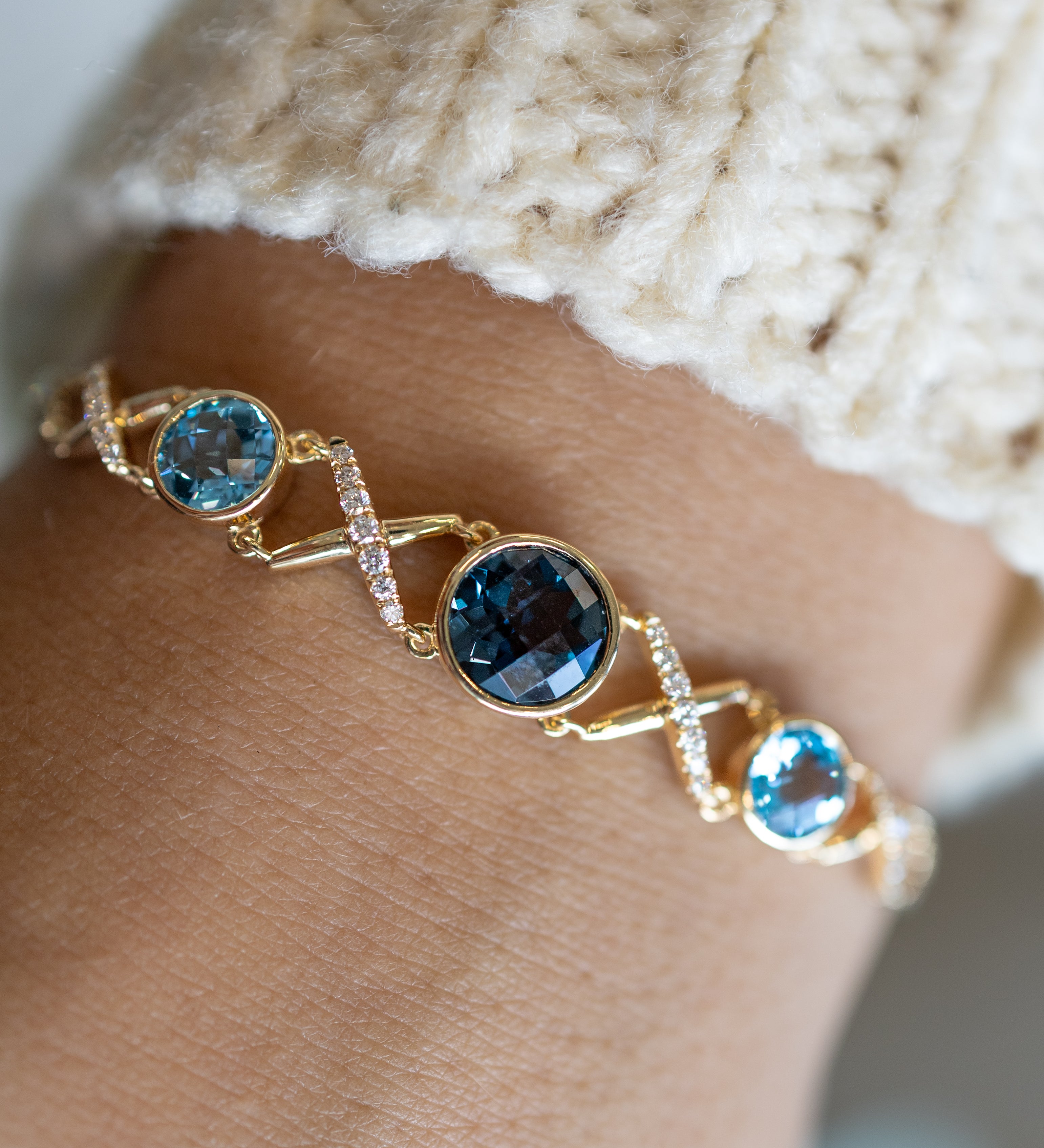 14K Yellow Gold .22CTW Diamond & Blue Topaz "XO" Bracelet