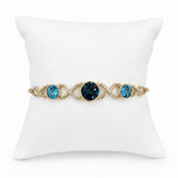 14K Yellow Gold .22CTW Diamond & Blue Topaz "XO" Bracelet