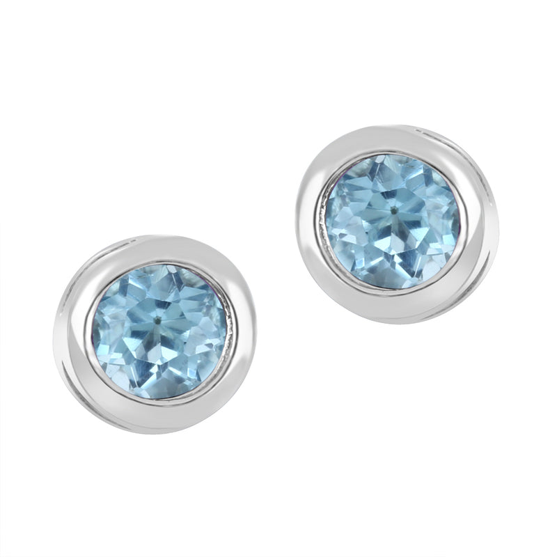 10K White Gold Bezel Blue Topaz Studs