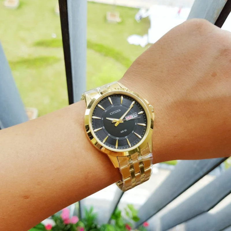 Citizen Quartz Gold Tone Watch with Black Dial