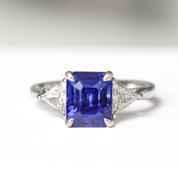 Platinum Sapphire Ring with Trillion Diamond Sides